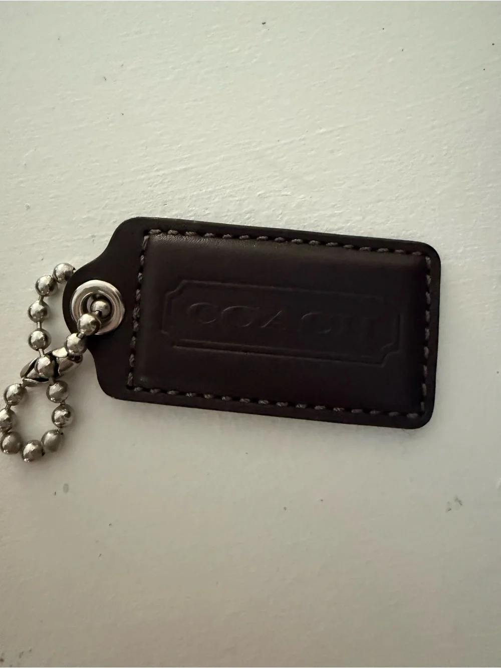 Coach brown leather hang tag fob 2.5”